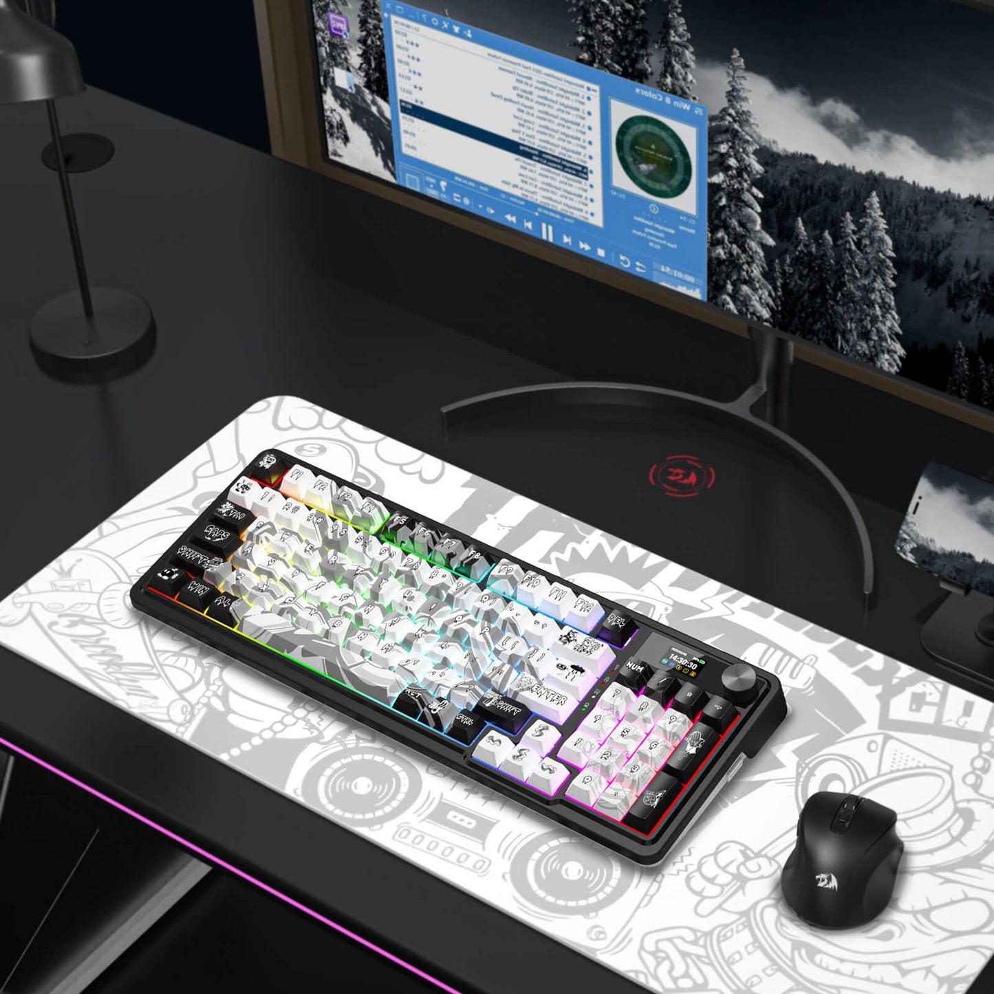 Gaming setup with keyboard, mouse, and monitor on a desk