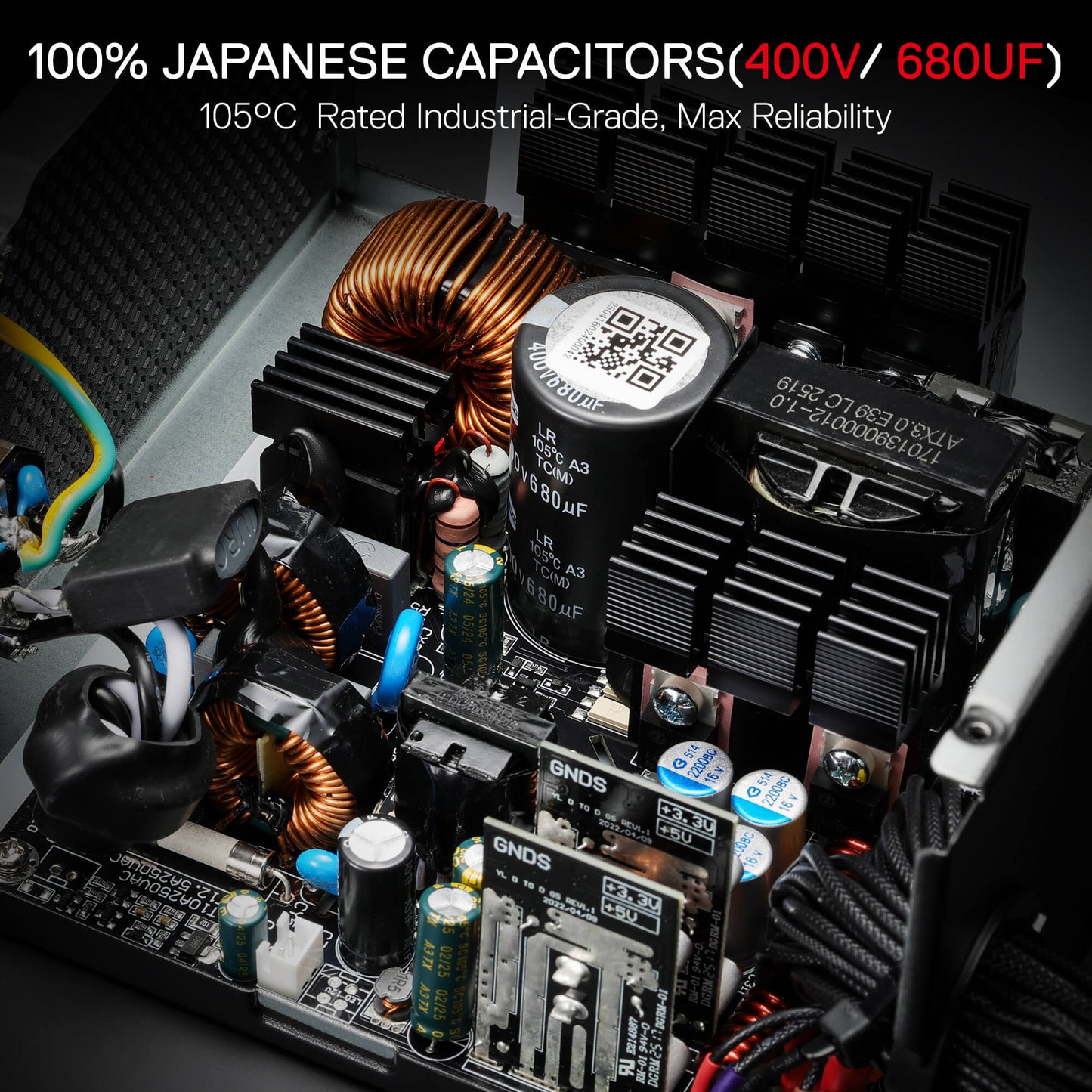 Close-up of electronic components with Japanese capacitors labeled on a dark background