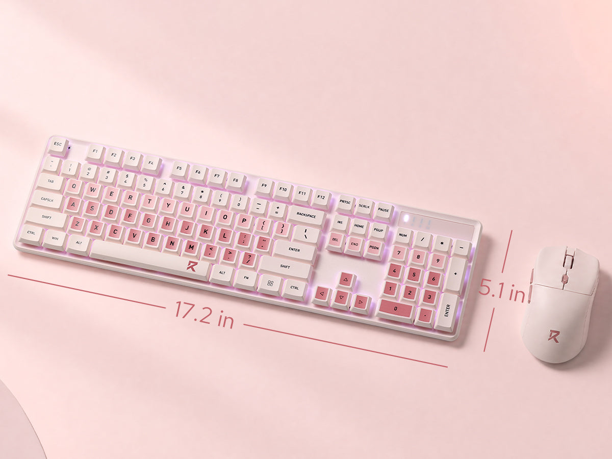 A pink and white mechanical keyboard and matching mouse set on a light pink background, with red dimension lines and text showing the size as 17.2 in by 5.