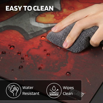 The mouse pad is "EASY TO CLEAN" (water-resistant, wipeable), demonstrated by a hand cleaning water droplets off its surface.