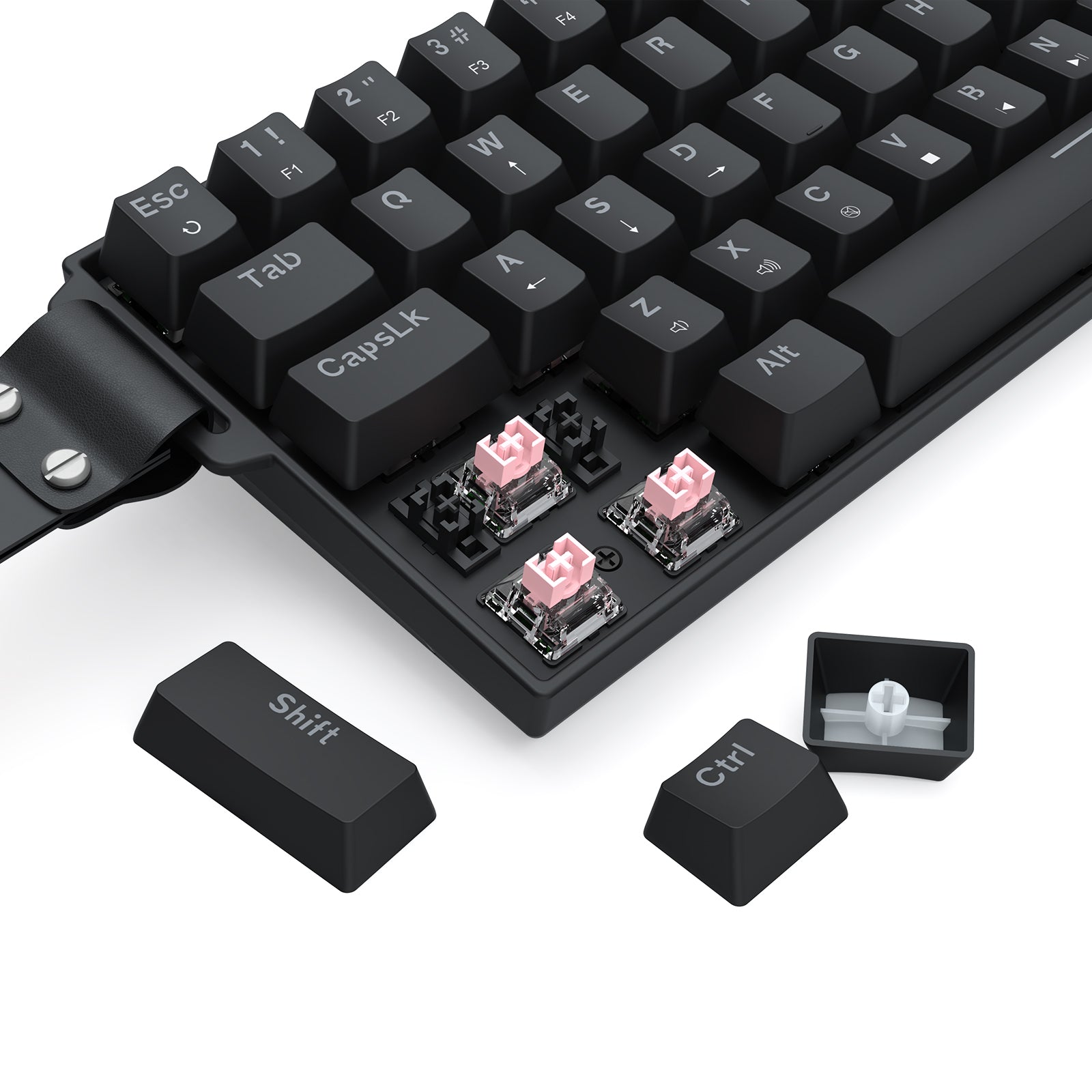 A black keyboard (with a portable strap) is shown with keycaps removed, exposing pink hot-swap switches—demonstrating its customizable keycap/switch setup.