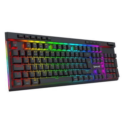 A black mechanical gaming keyboard with vibrant RGB rainbow backlighting, shown at an angle against a solid black background. The brand name 'iNSPACHT' is visible on the spacebar area.