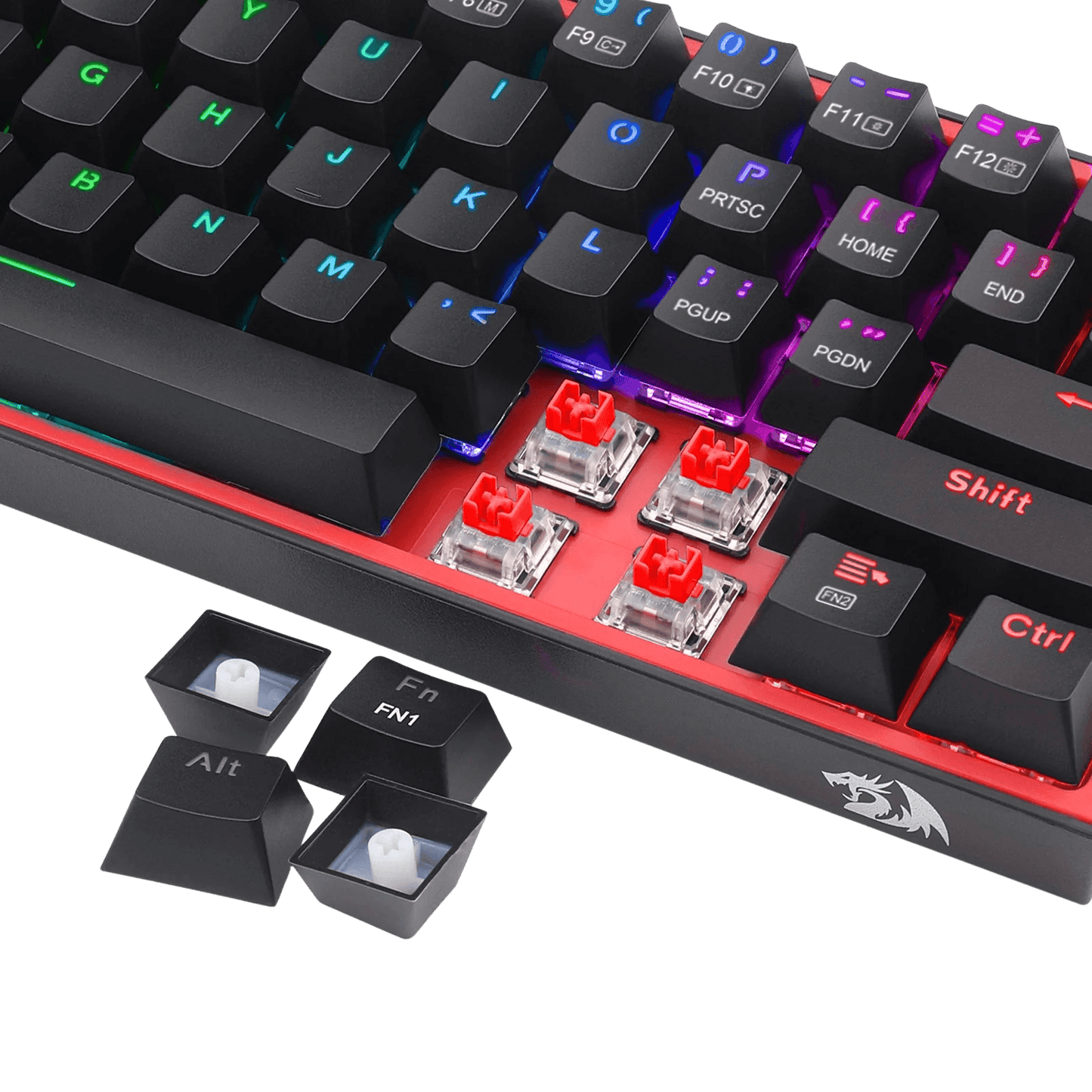 A close-up of a mechanical keyboard with black keycaps, red switch housings, and RGB backlighting, shown on a black background with two removable keycaps placed in front.