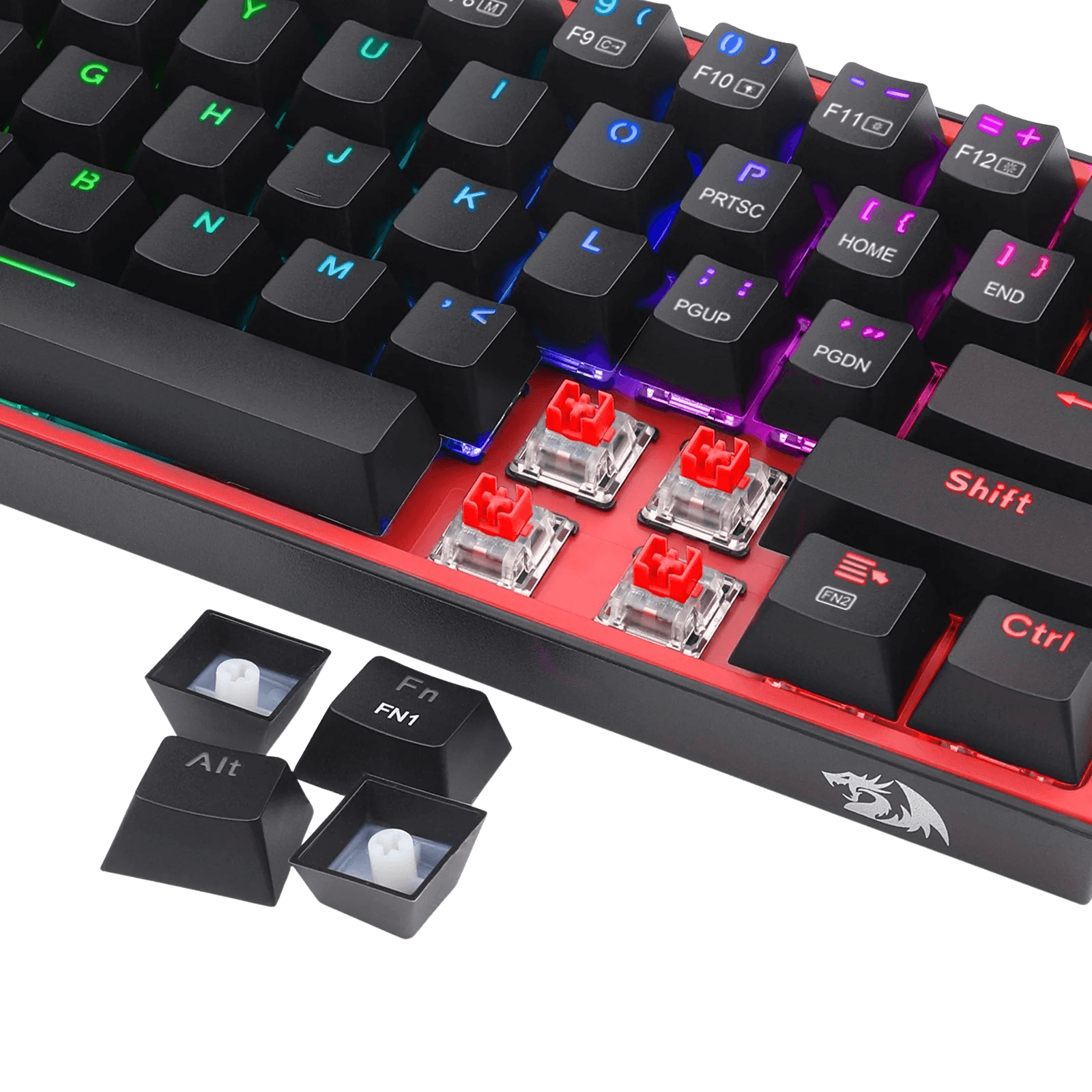 A close-up of a mechanical keyboard with black keycaps, red switch housings, and RGB backlighting, shown on a black background with two removable keycaps placed in front.