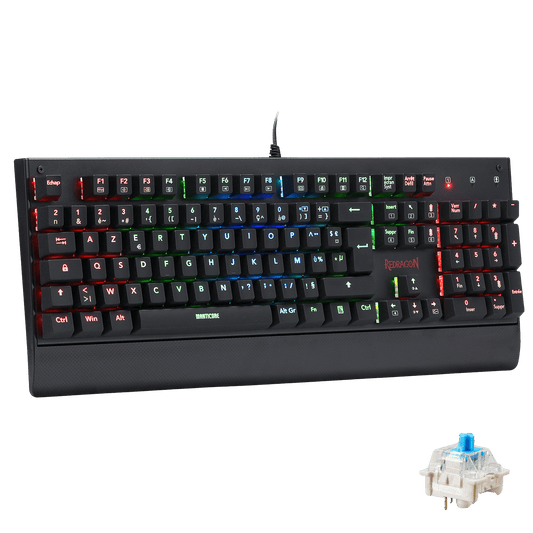 Le clavier mécanique Redragon Manticore est affiché avec son éclairage RGB multicolore, un repose-poignet intégré et un interrupteur bleu détachable pour démontrer son design modulaire.