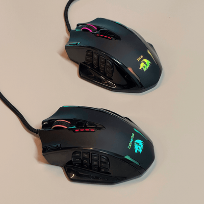 Redragon Two black gaming mice with RGB lighting on a beige background