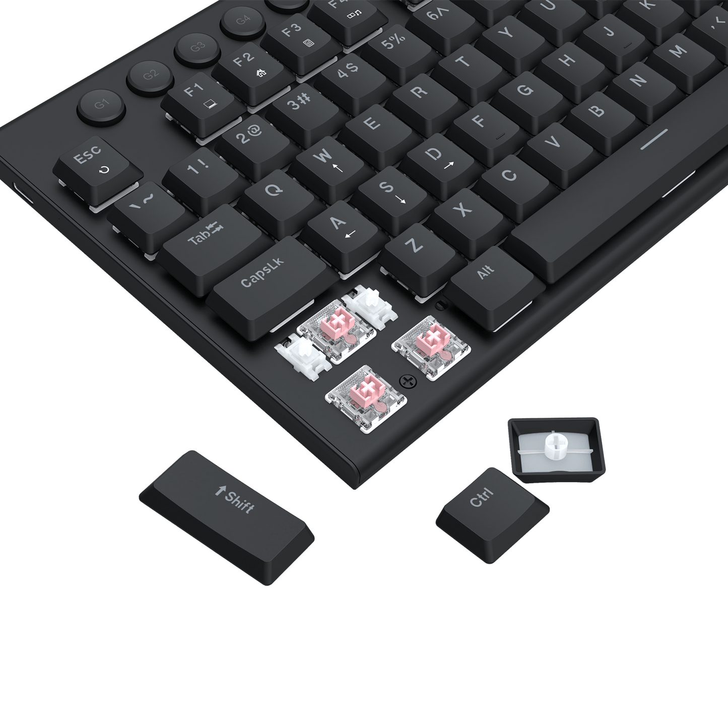 A close-up of a black mechanical keyboard with four transparent keycaps shown below on a black background. The keycaps include a 1-Shift, Ctrl, and CapsLock, with two showing the clear plastic shells and one showing the white key centers.