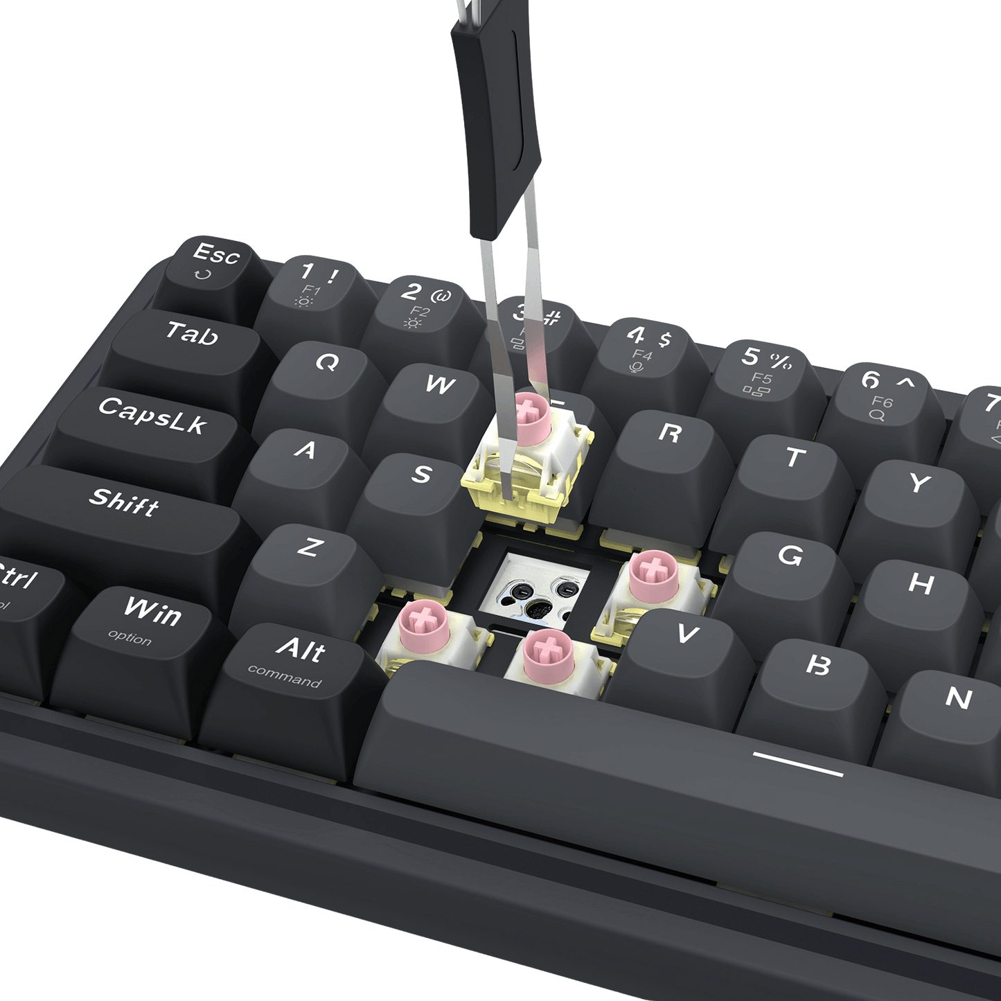 Close-up of a mechanical keyboard with keycaps being removed using tweezers.