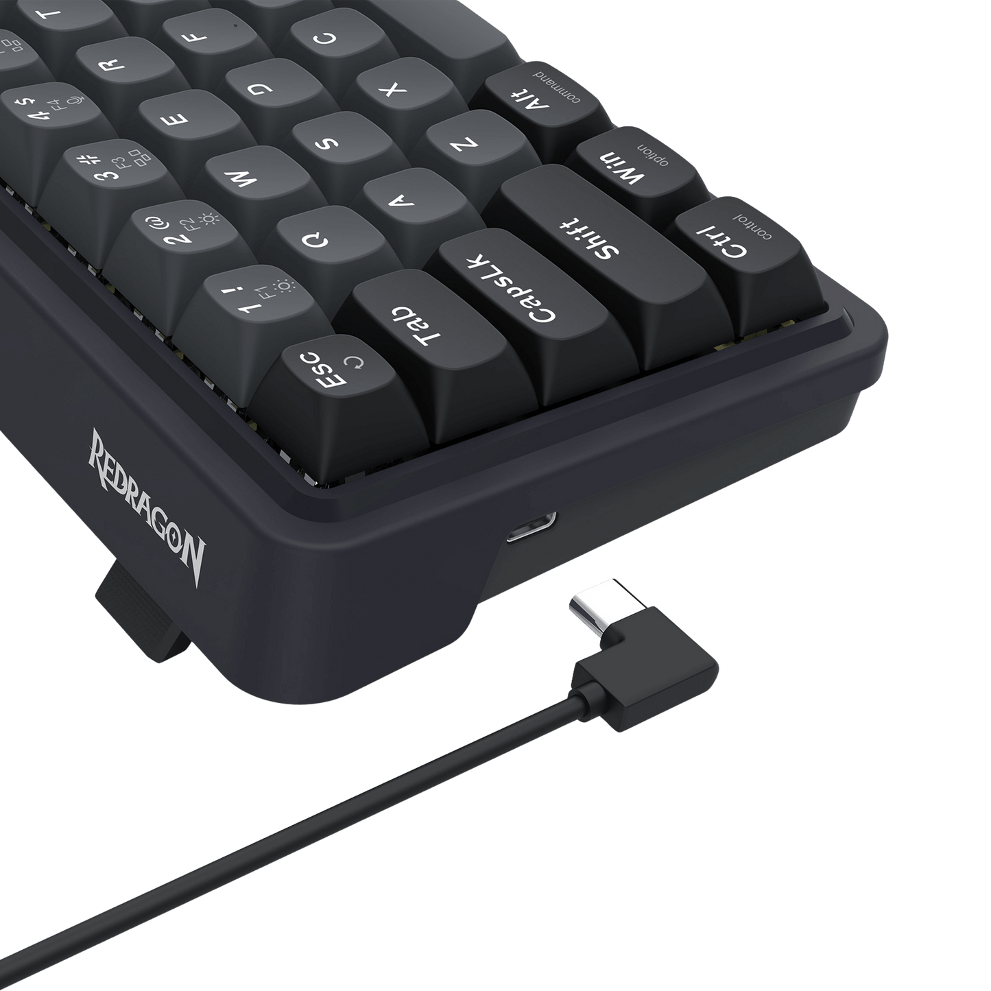 Black keyboard with USB cable on a black background, featuring the Redragon brand.