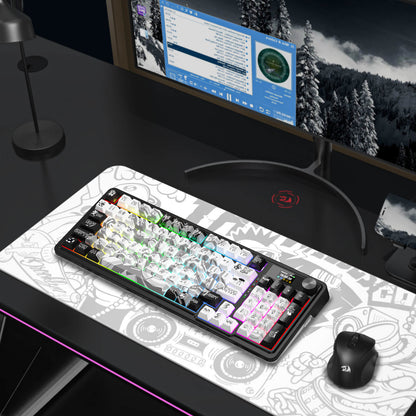 Gaming setup with keyboard, mouse, and monitor on a desk