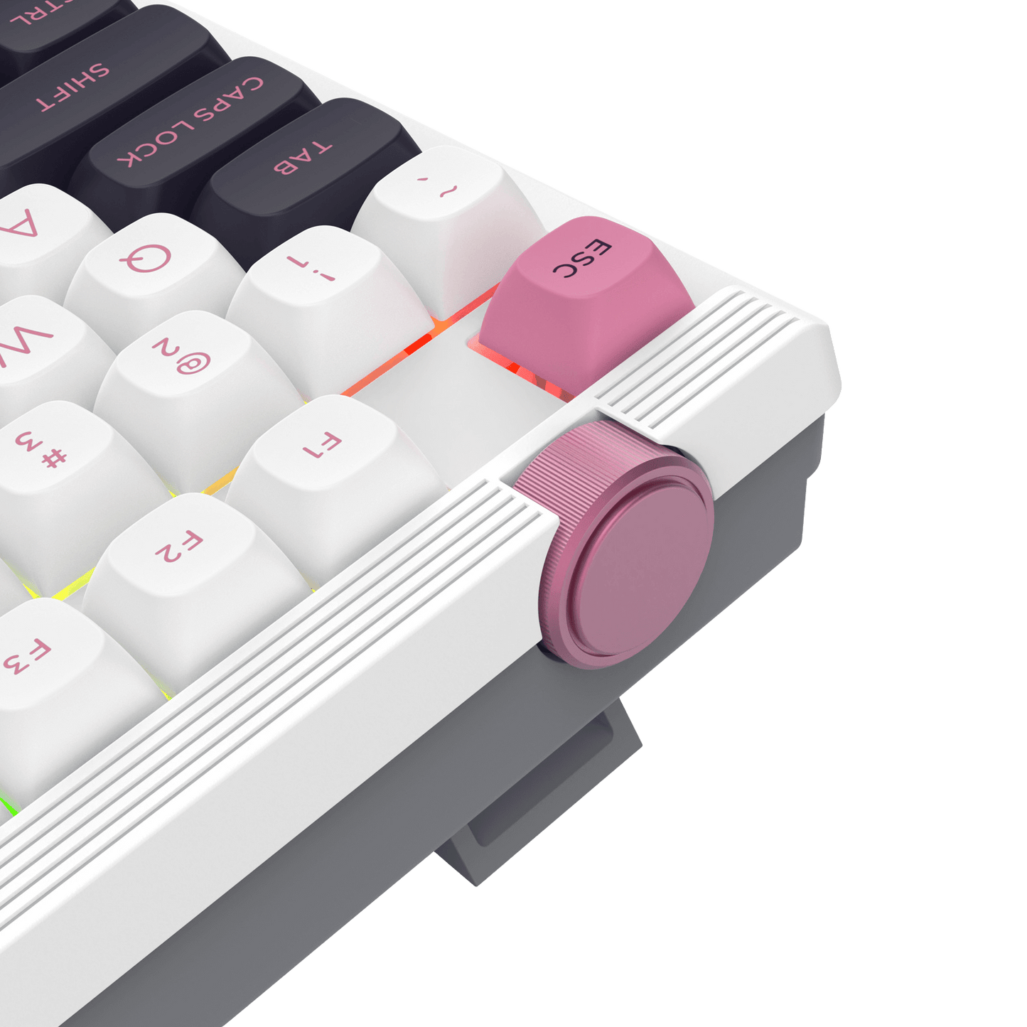 Close-up of a mechanical keyboard with pink escape key on a white background