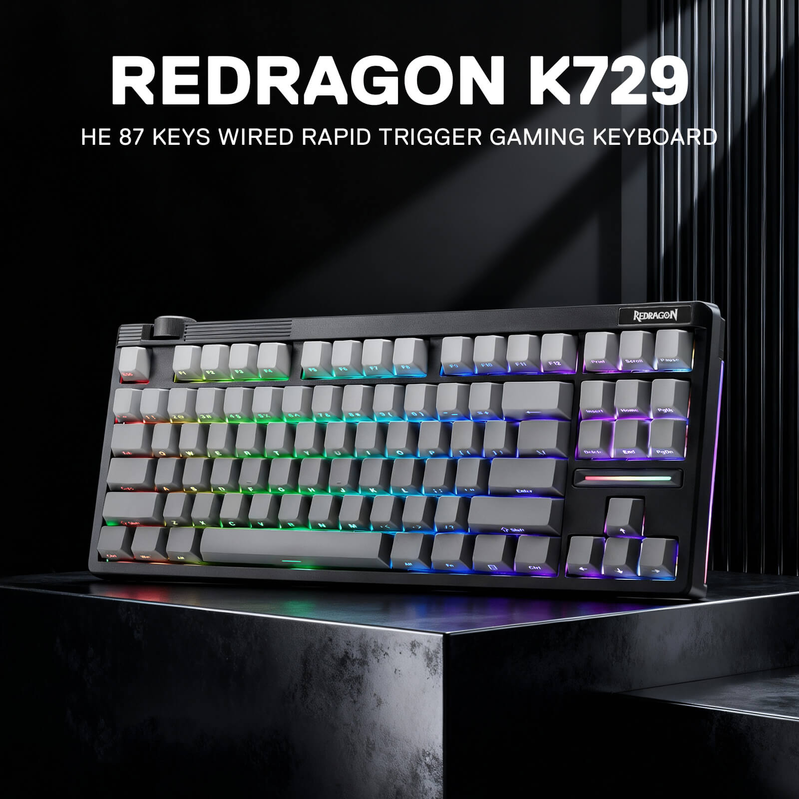 Redragon K729 gaming keyboard with RGB lighting on a dark background