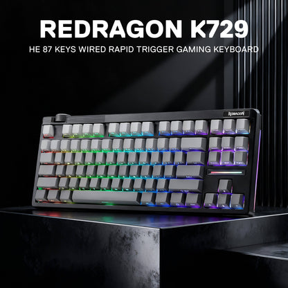 Redragon K729 gaming keyboard with RGB lighting on a dark background