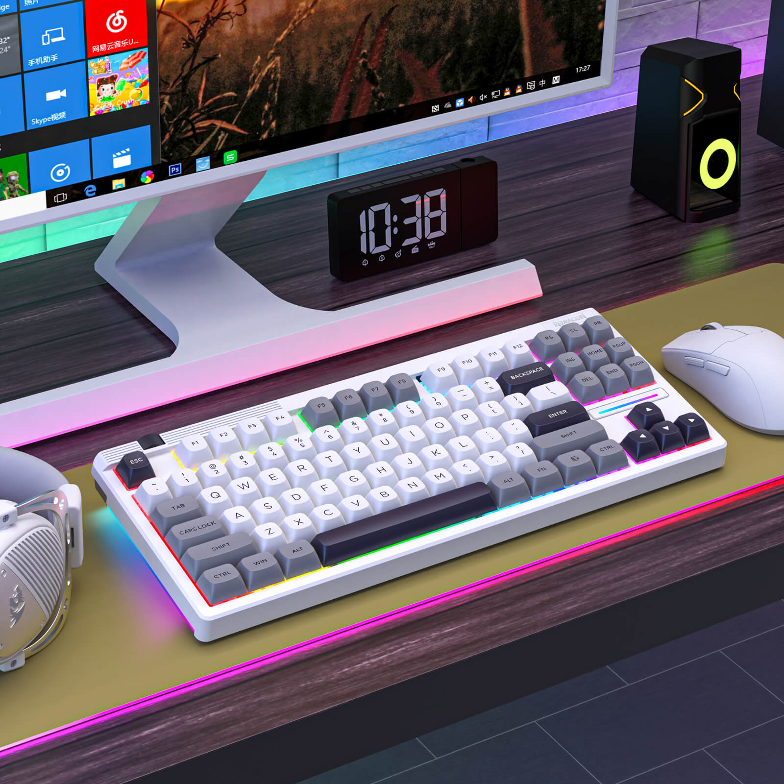 Computer setup with keyboard, mouse, monitor, and clock on a desk