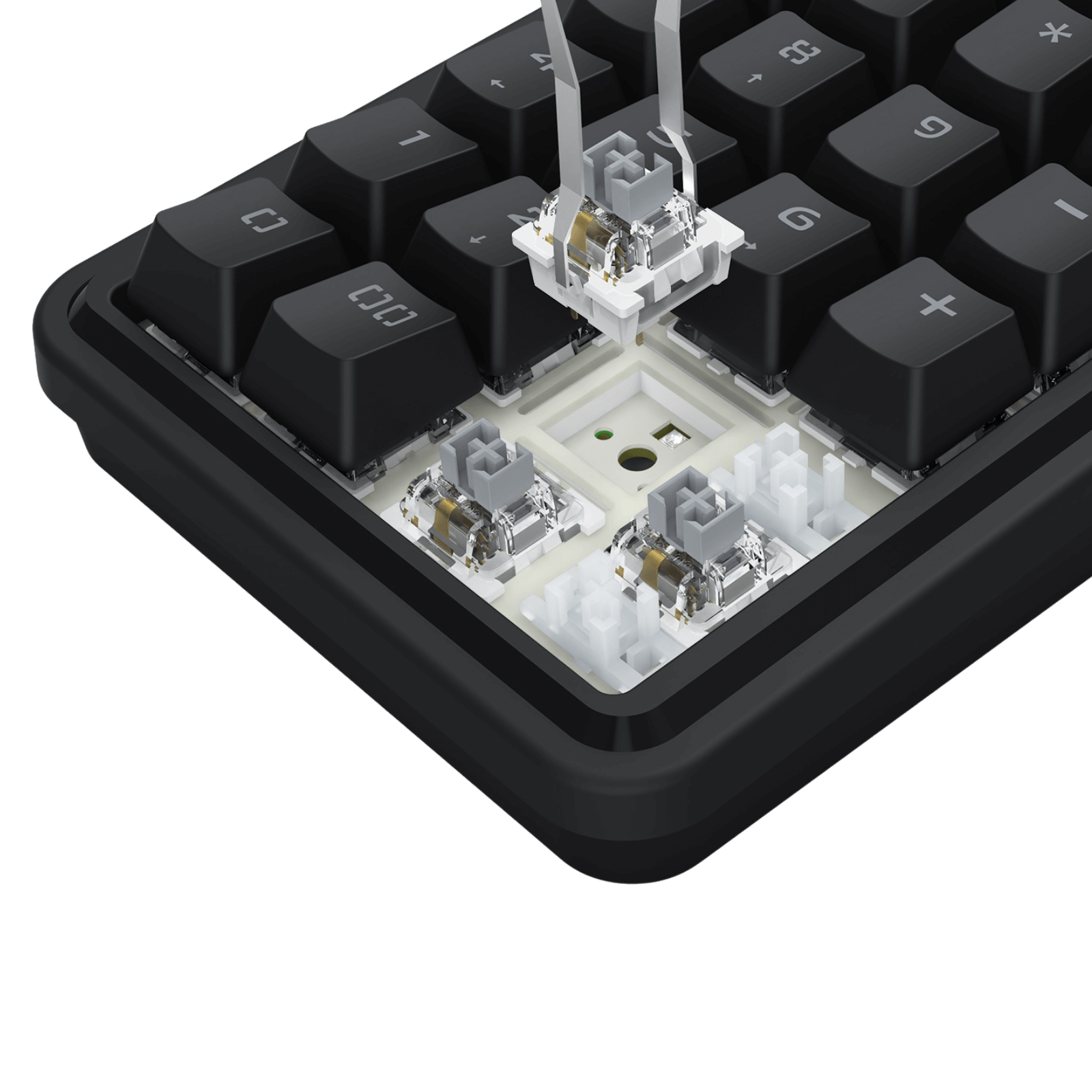 Close-up of a mechanical keyboard with exposed circuitry on a black background