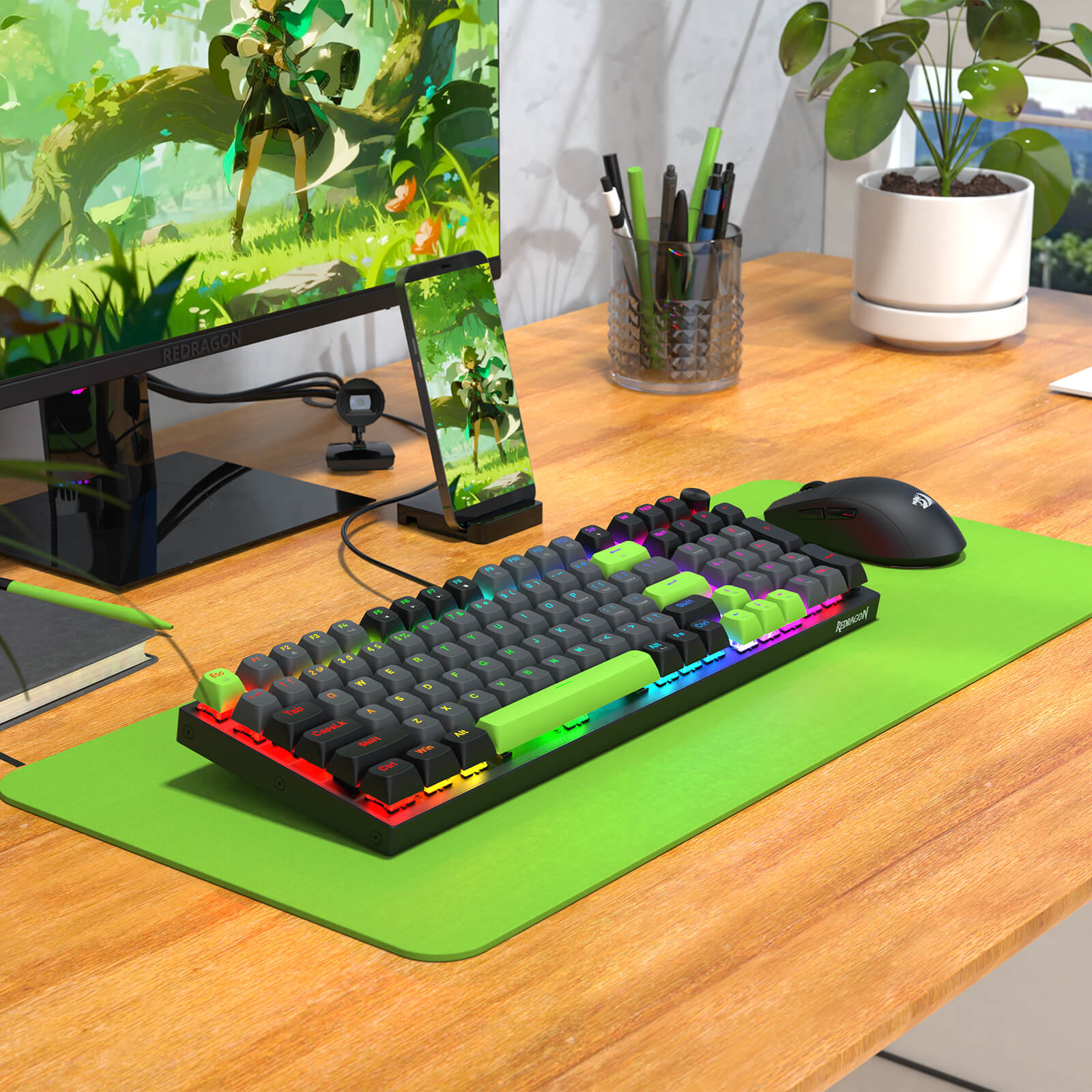 Gaming setup with RGB keyboard, mouse, and monitor on a desk.
