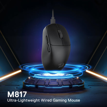 Redragon M817 Lightweight Small Black gaming mouse with glowing blue effects on a dark background