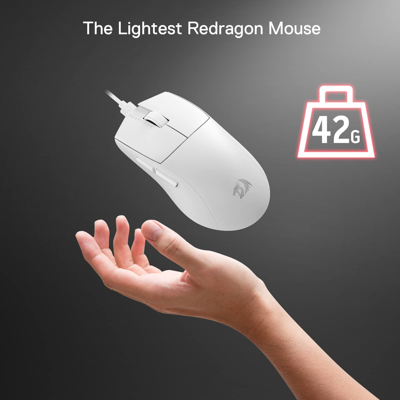 A hand holding up the ultra-light 42g Redragon M996 white mouse.