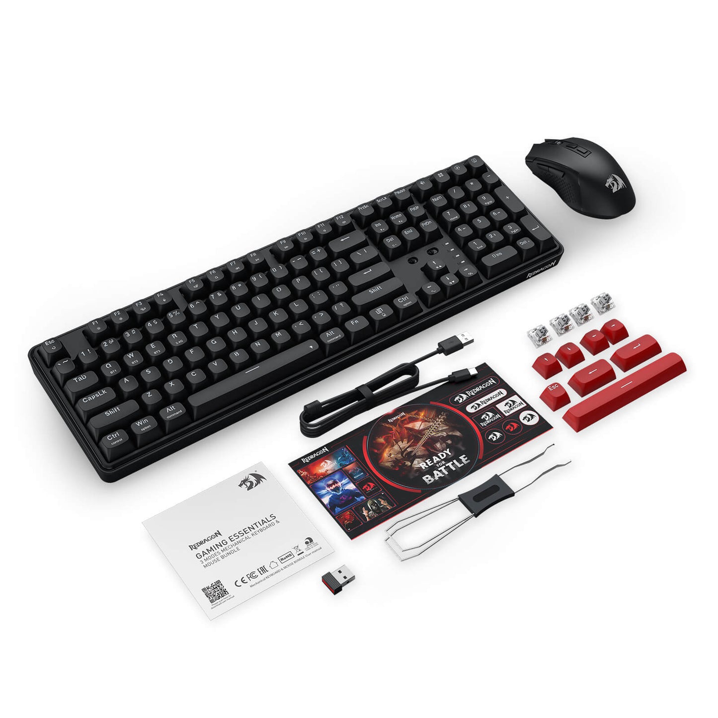 The complete Redragon gaming bundle is laid out, including the keyboard, mouse, USB-C cable, 2.4G receiver, keycap puller, red replacement keycaps, mechanical switches, and user manual.