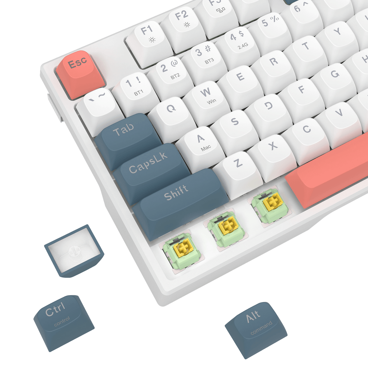White mechanical keyboard keycap set with custom key labels, showing detached keys and three exposed switches on a black background.