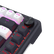 Close-up of  Redragon K673 mechanical keyboard with illuminated keys on a black background