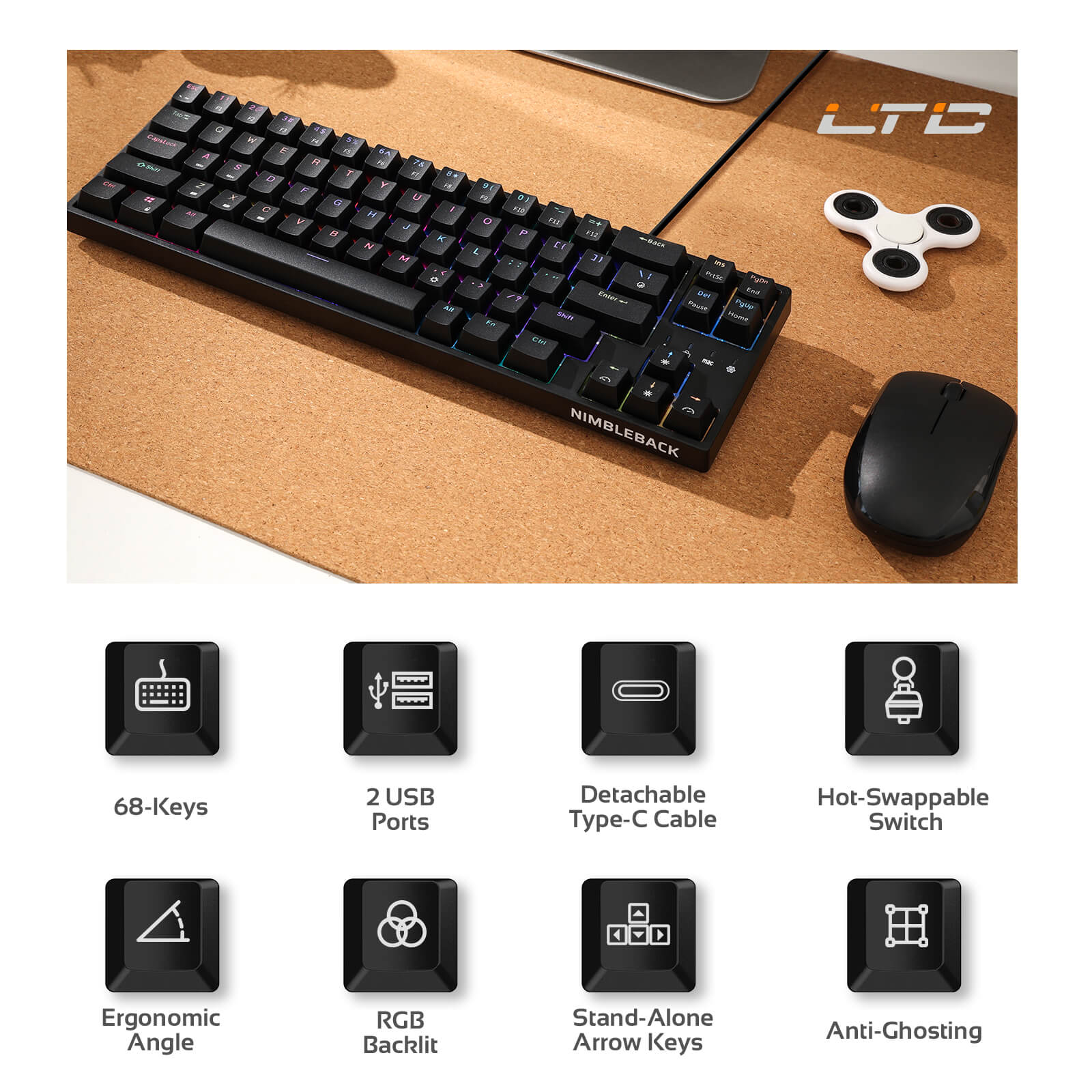 Black keyboard on a desk with mouse and fidget spinner, featuring LTC branding.