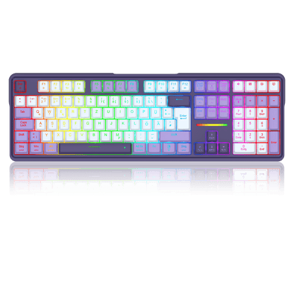 A full-sized mechanical keyboard shown from above on a black background, with RGB backlighting transitioning through a rainbow spectrum of colors across the keys.