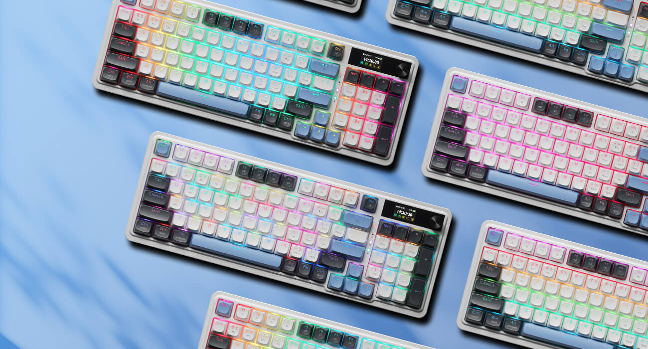 Redragon K719 Multiple colorful keyboards on a blue surface