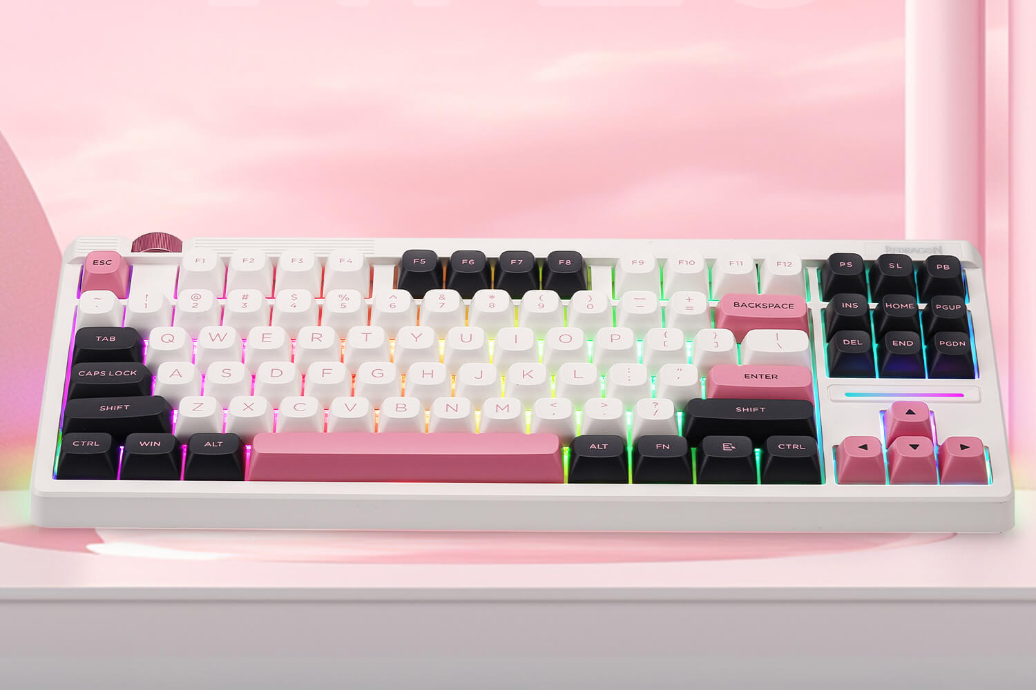 Mechanical keyboard with RGB lighting on a pink background