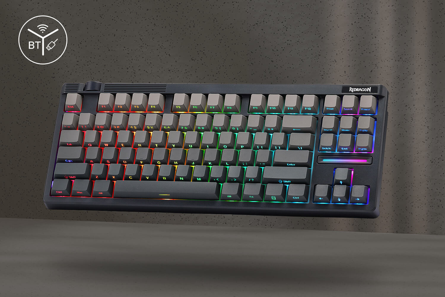 Redragon Tri-mode Gaming keyboard with RGB lighting on a dark background