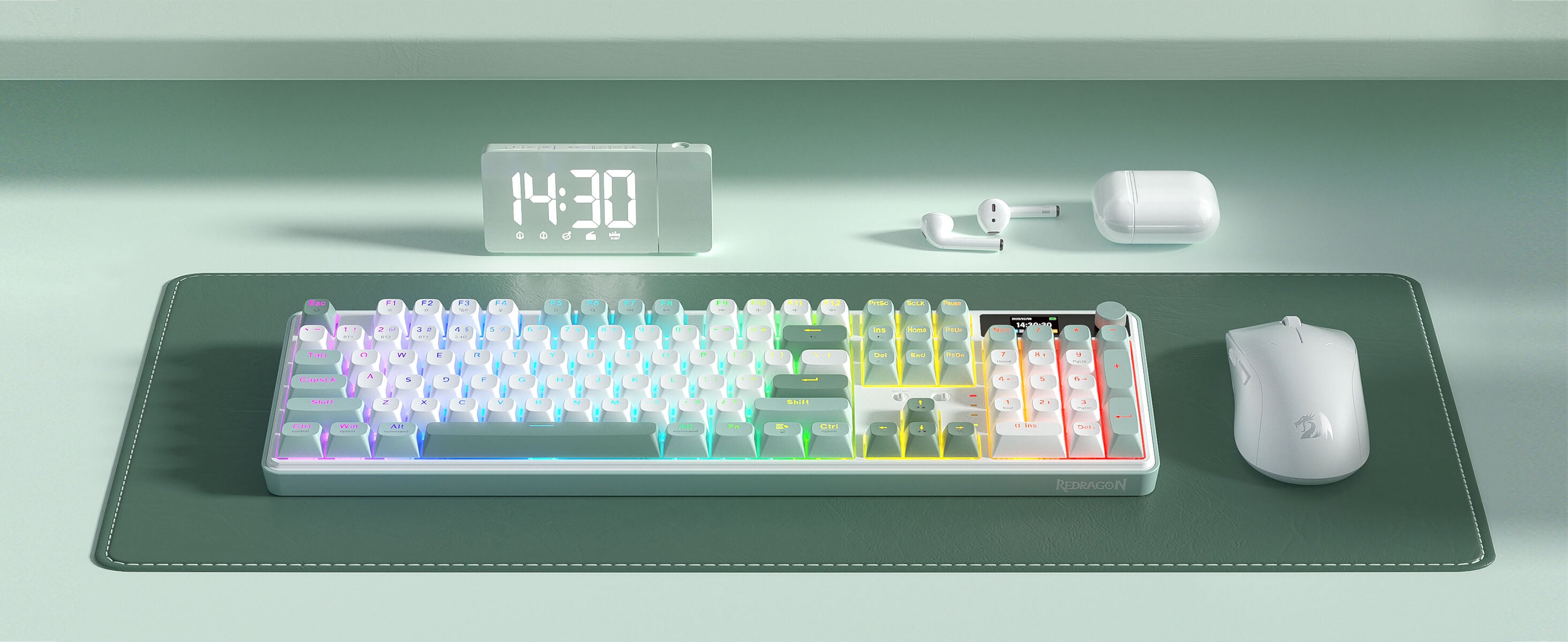 Redragon K761 Keyboard with RGB backlighting on a desk, next to a digital clock and mice.